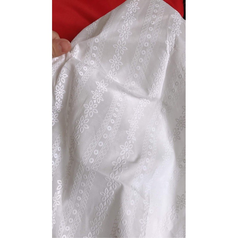 vải boi trắng trơn đục lỗ hình hoa