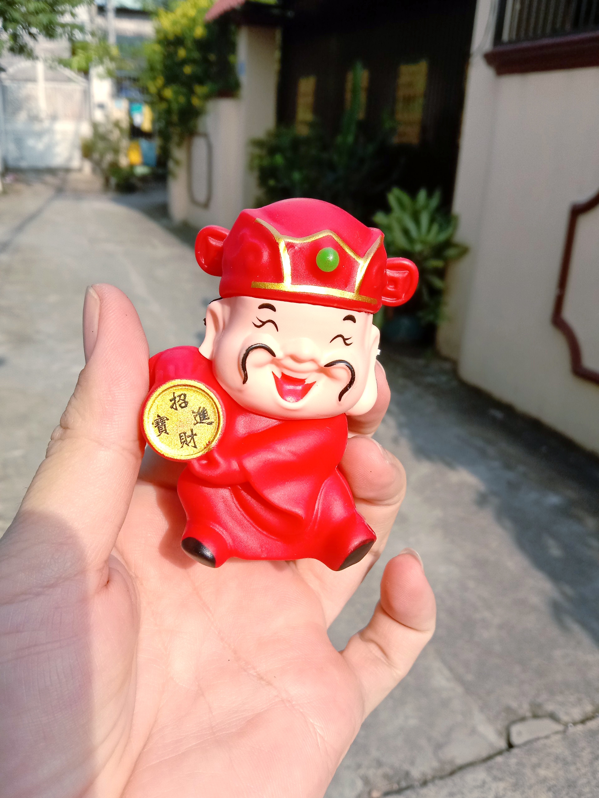 mèo may mắn, thần tài