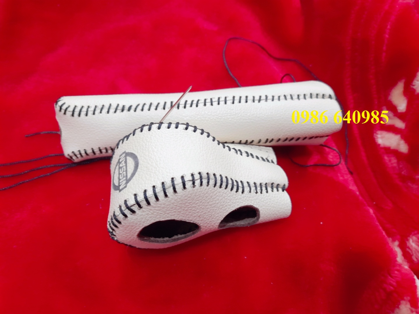 Bọc da cần số + phanh tay Nissan Sunny (AT)
