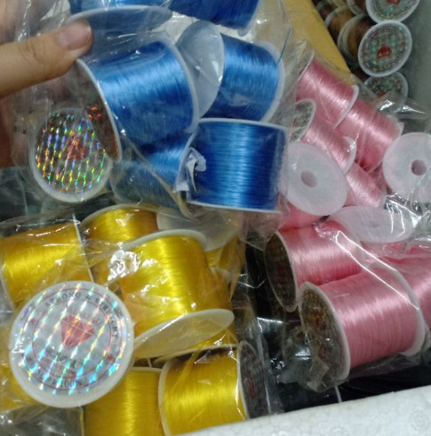 Cước tơ dẹt xỏ vòng chuỗi hạt đá phong thuỷ (70m)