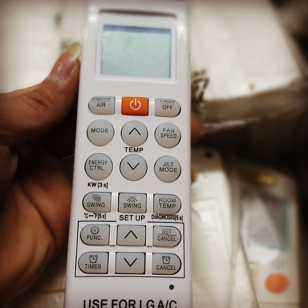Khiển điều hòa LG nút cam