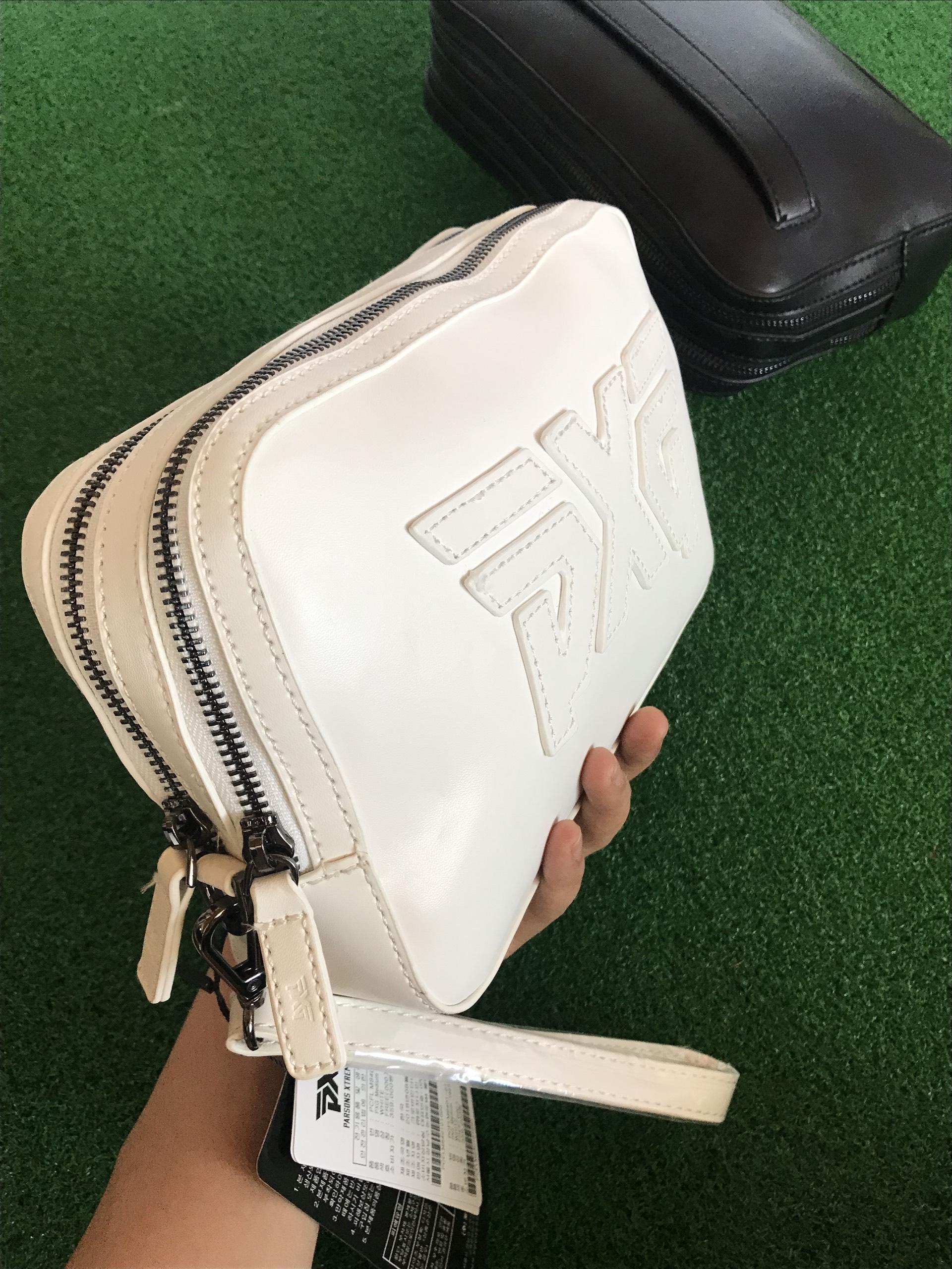 Túi cầm tay golf pxg