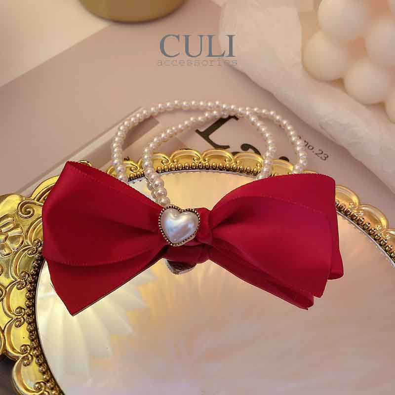 Cột tóc nơ dây ngọc trai xinh xắn