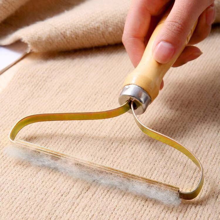 Dụng cụ cạo lông xù trên mọi bề mặt vải