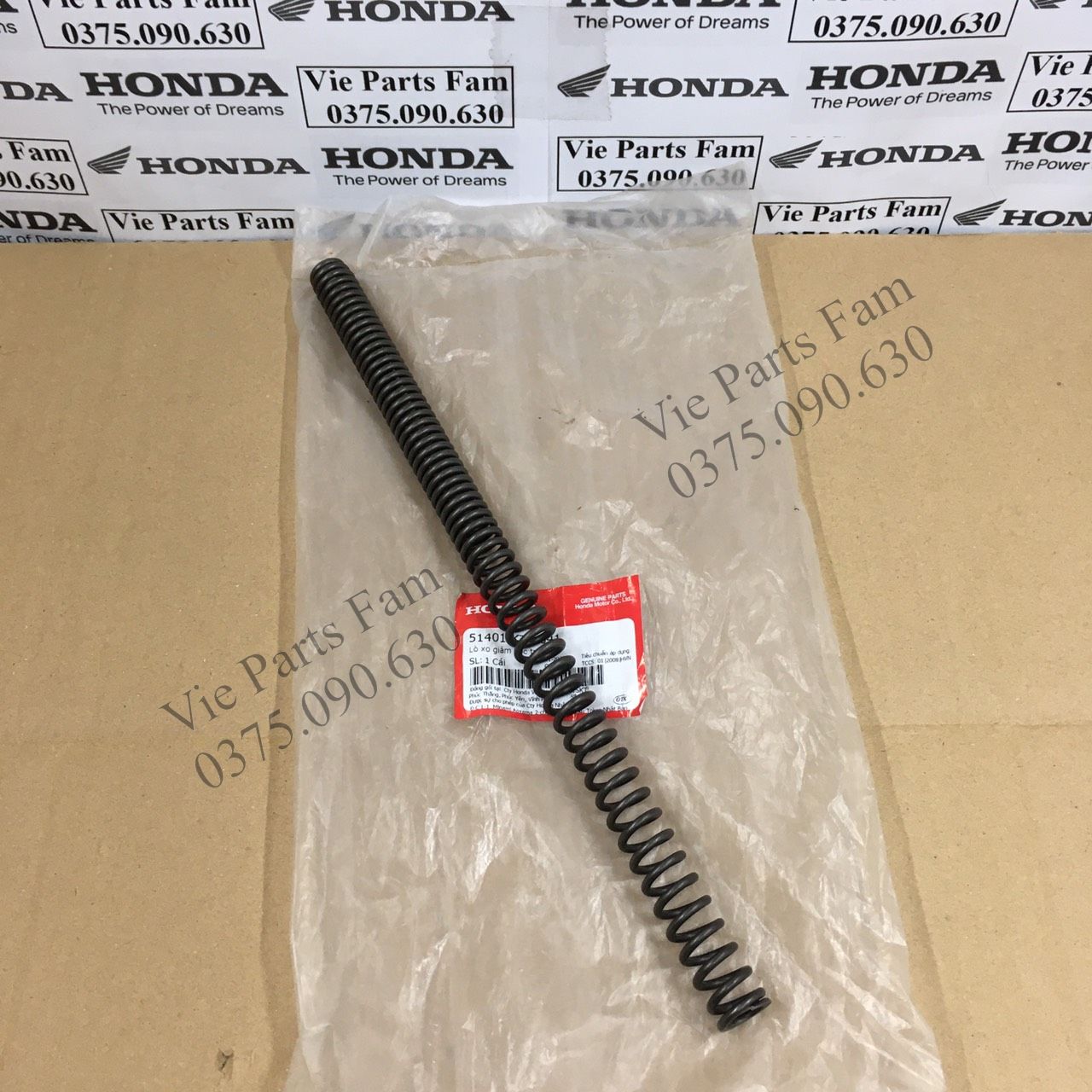 Lò xo phuộc trước dream chính hiệu honda motor vn