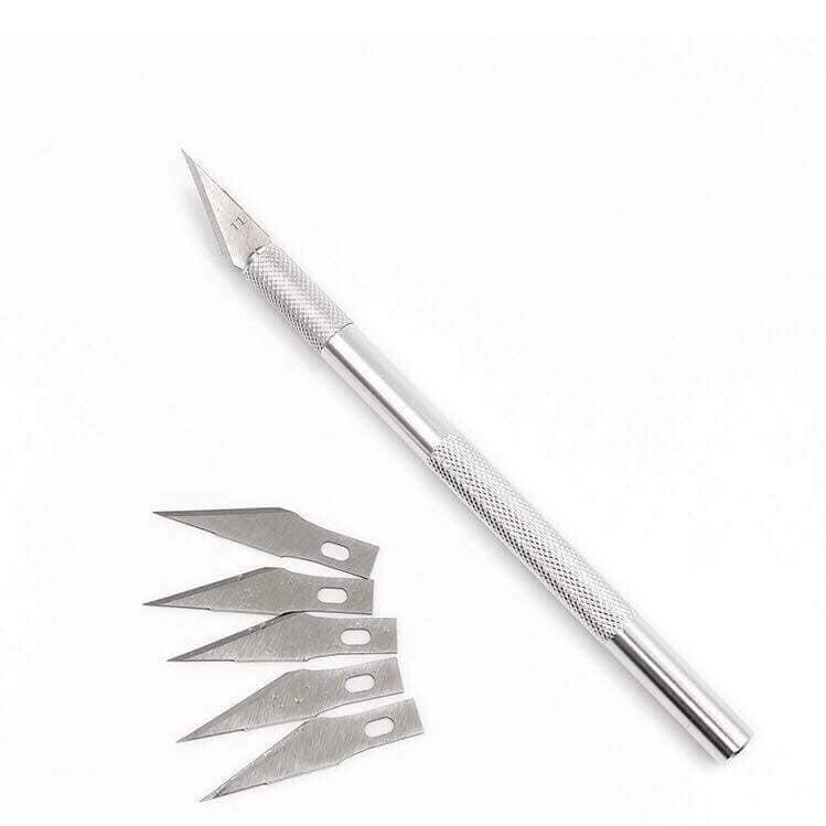 Dao cắt bột Nail