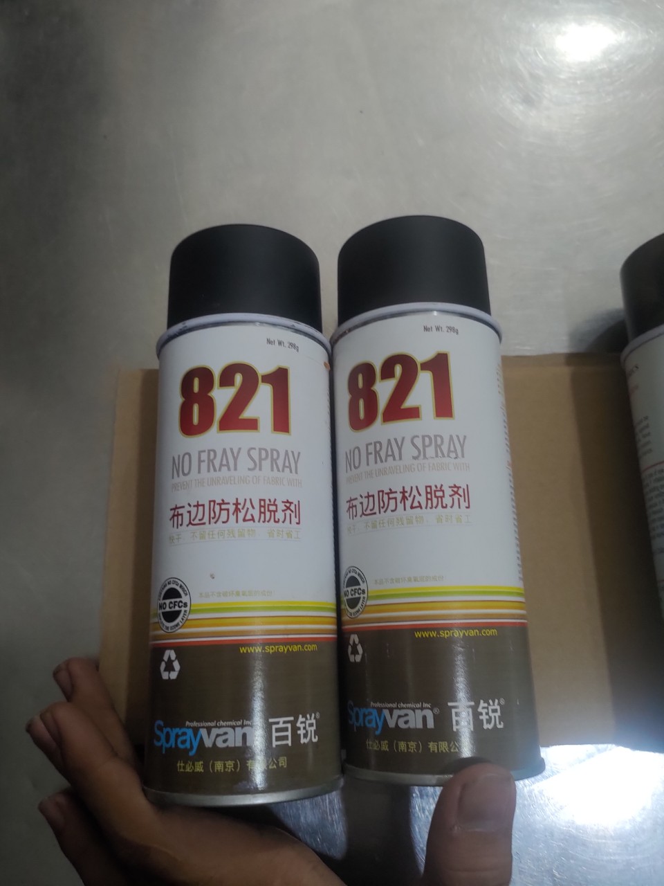 chai chống quăn mép vải 821 tốt