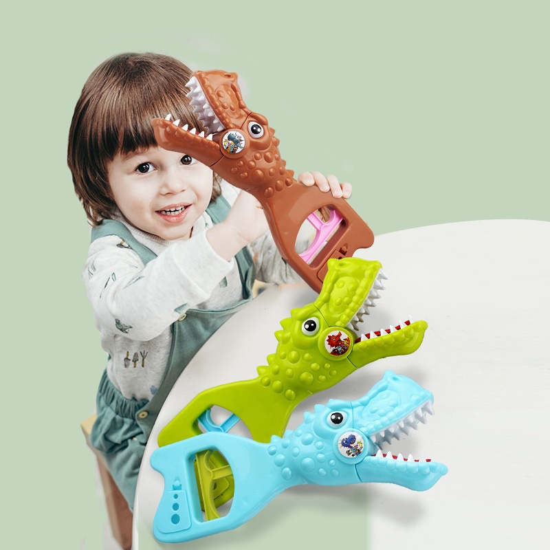 kẹo đồ chơi kẹp hình khủng long vui nhộn dành cho trẻ em
