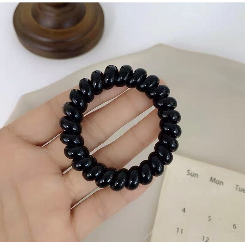 Dây buộc tóc lò xo đen, chun buộc tóc lò xo nhựa co giãn DC07