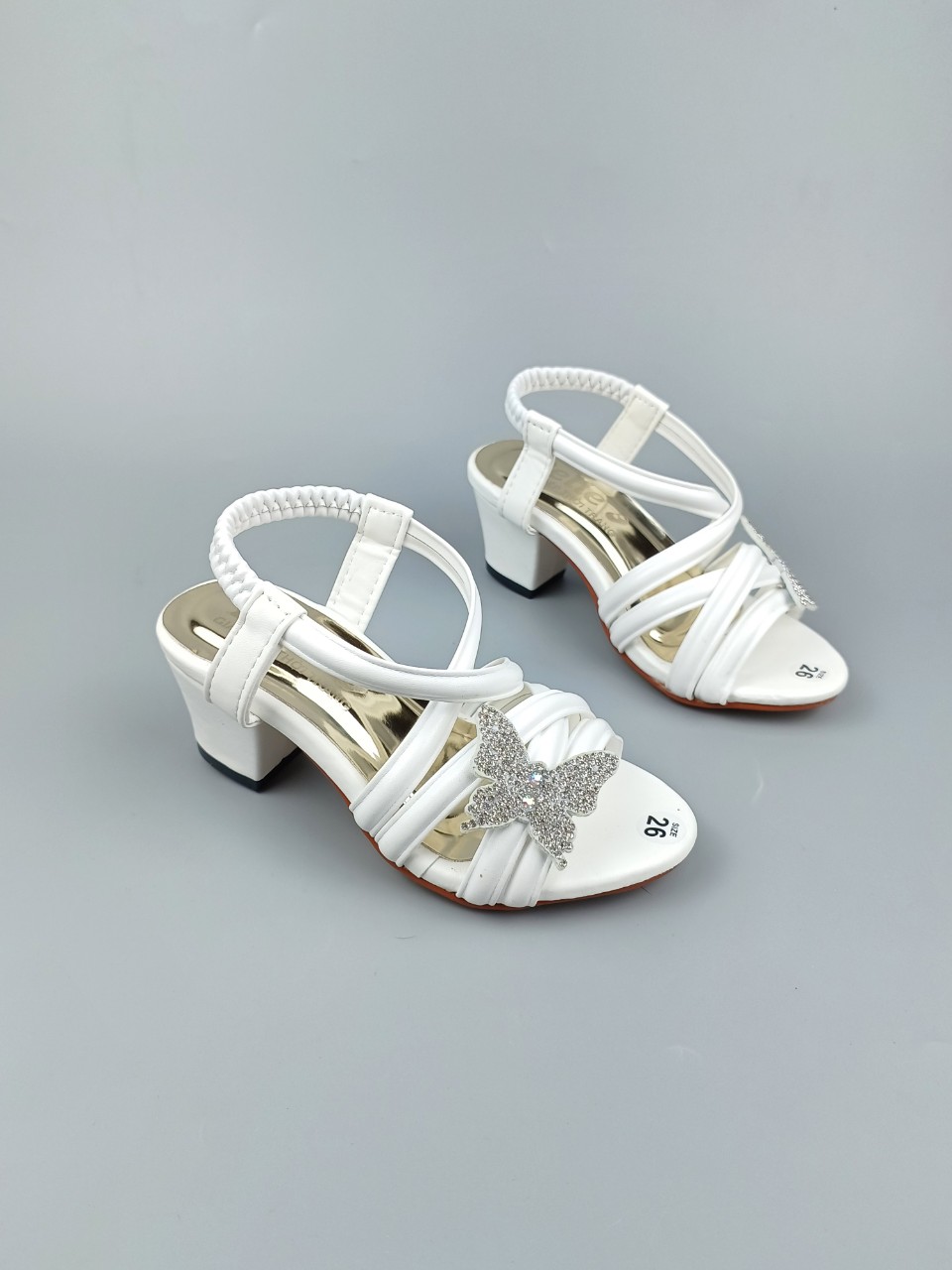 Giày sandal bé gái gót 3cm nơ bướm đóng nút