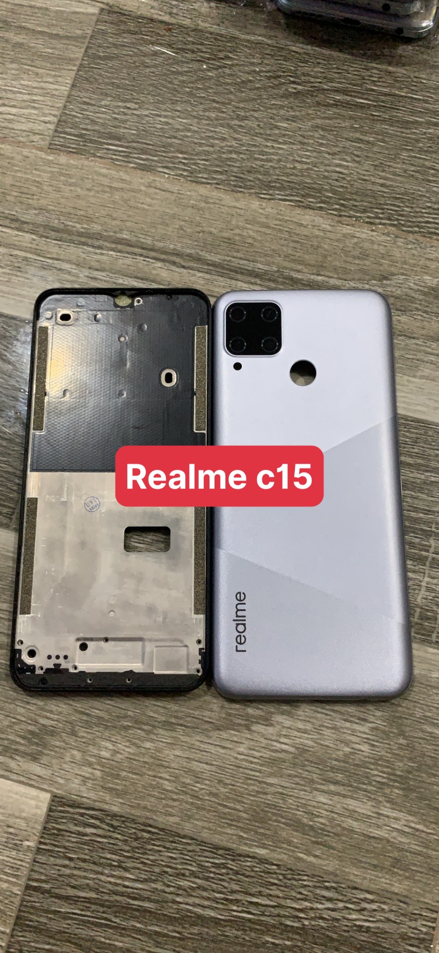 bộ vỏ realme C15 ( gồn, sườn, lưng,nút bấn,kính cam )zin