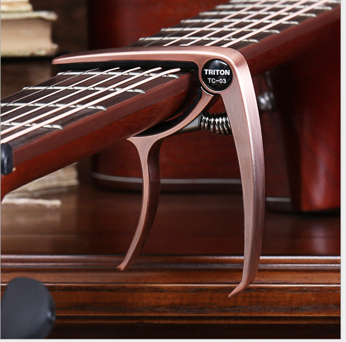 Capo Đàn Guitar/Ukulele Vân Gỗ TC-03.