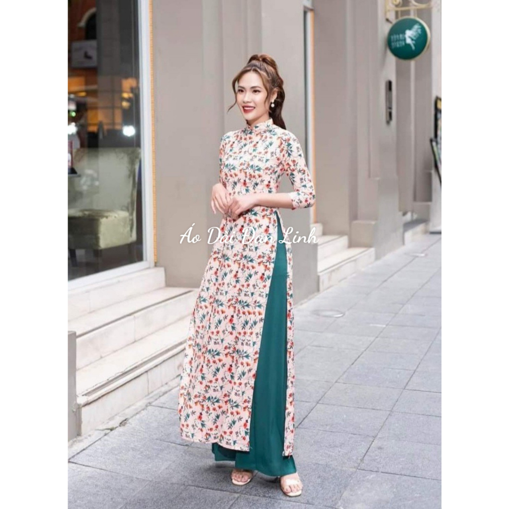 Áo dài hoa nhí nền hồng - Áo Dài Đan Linh
