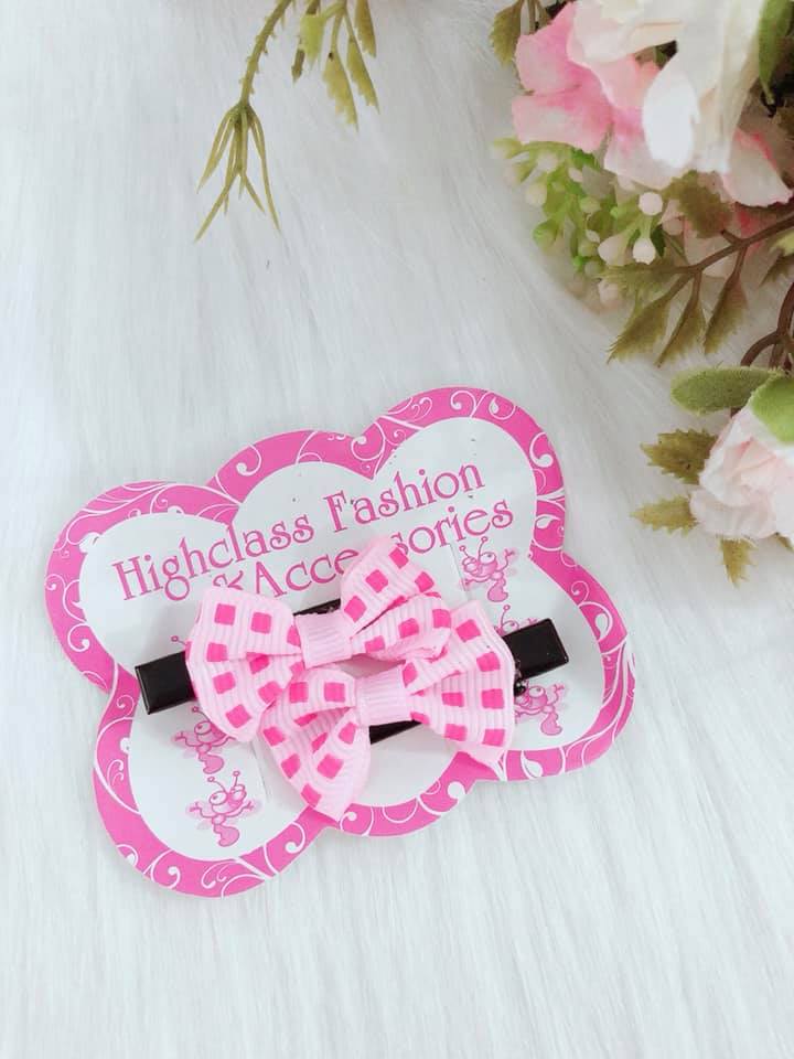 Set 2 cặp kẹp nơ cho bé gái, giao màu ngẫu nhiên.