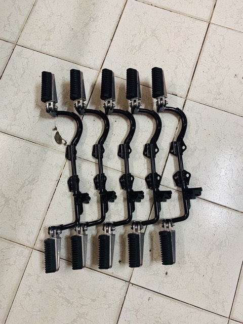 [HCM]gác chân máy kiểu  xe Yamaha gập gù