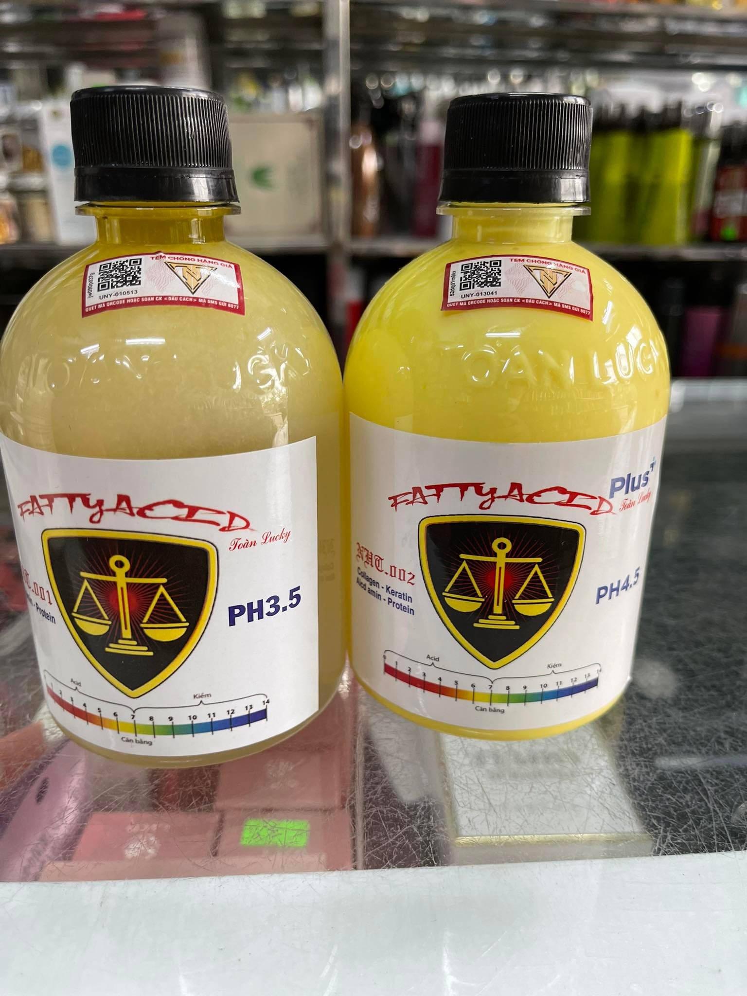 Axit béo hỗ trợ nhuộm, uốn, duỗi, tẩy , phục hồi tóc tnt 450 ml