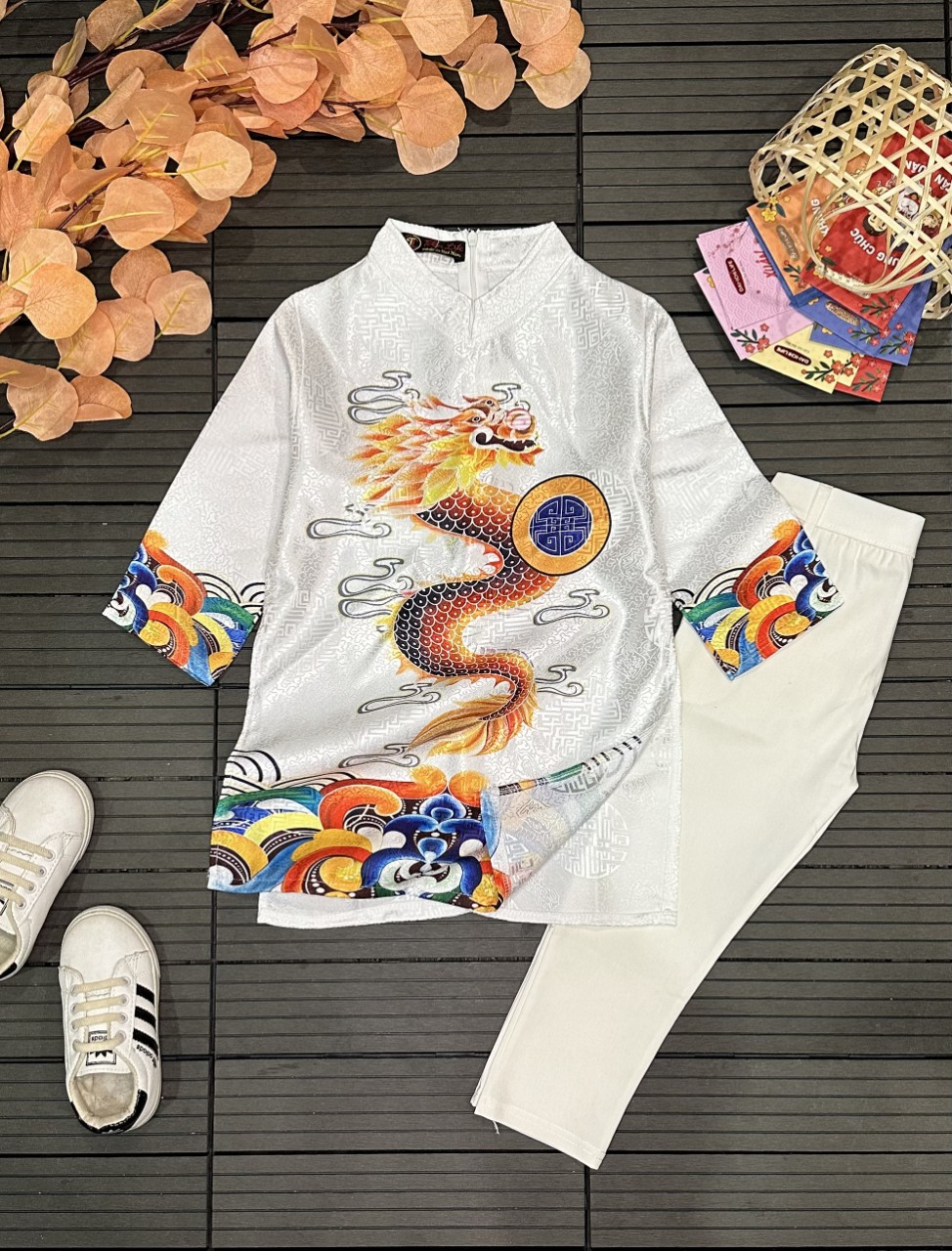 áo dài cách tân bé trai Chất liệu vải gấm.
