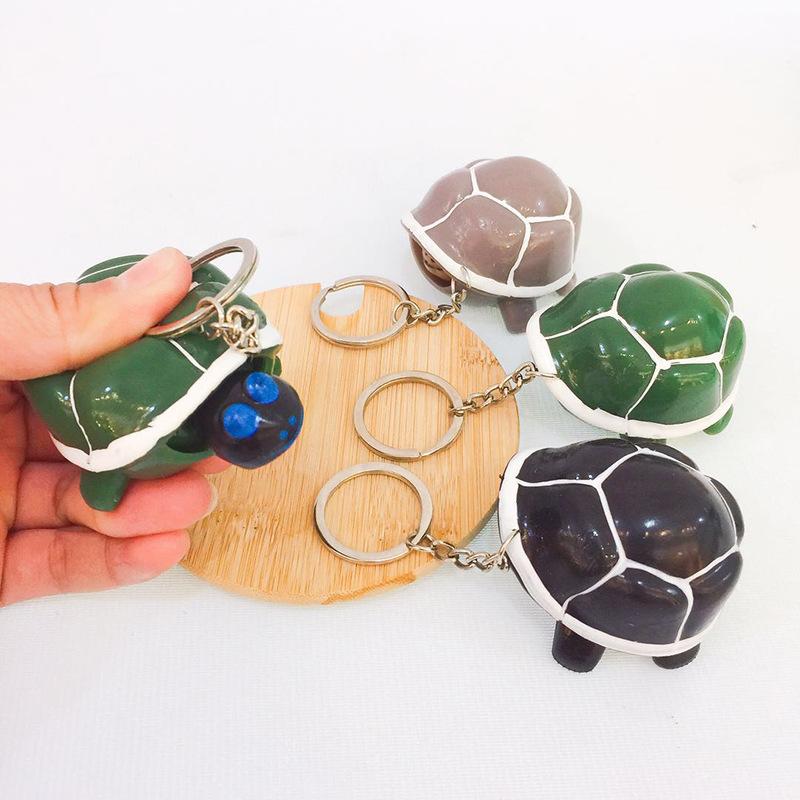 Móc khóa bóp rùa thụt đầu