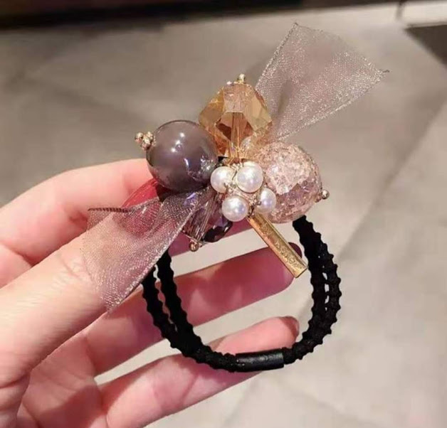 cột tóc đính đá