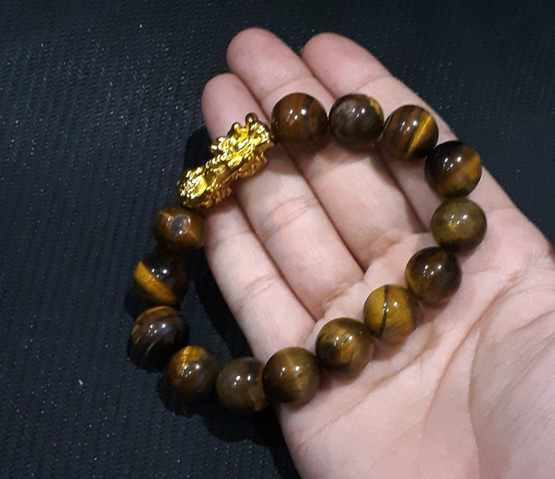 (VÒNG BÌNH AN – TÀI LỘC) Vòng Tay Tỳ Hưu Hạt Đá Mắt Hổ Phong Thủy Tài Lộc - Loại cao cấp vàng nâu