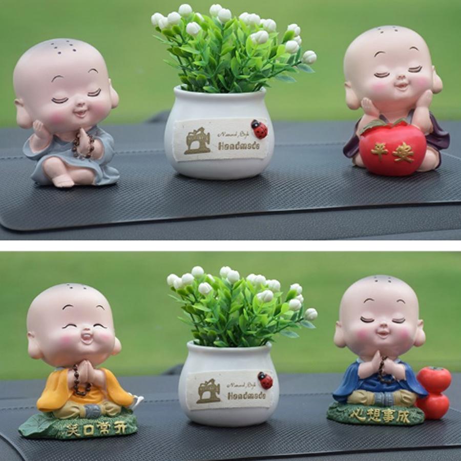 Tượng chibi chú tiểu tươi cười