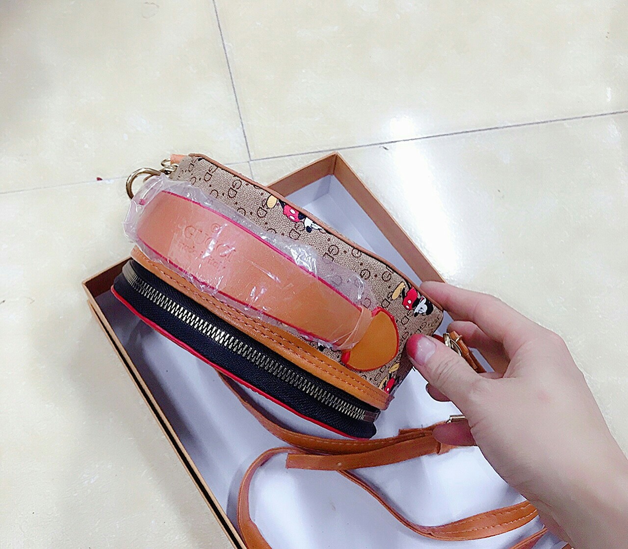 Túi nữ đeo chéo chuột trống tròn HL 276