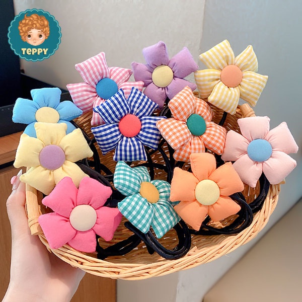 Cột tóc, búi tóc cho bé gái hình bông hoa