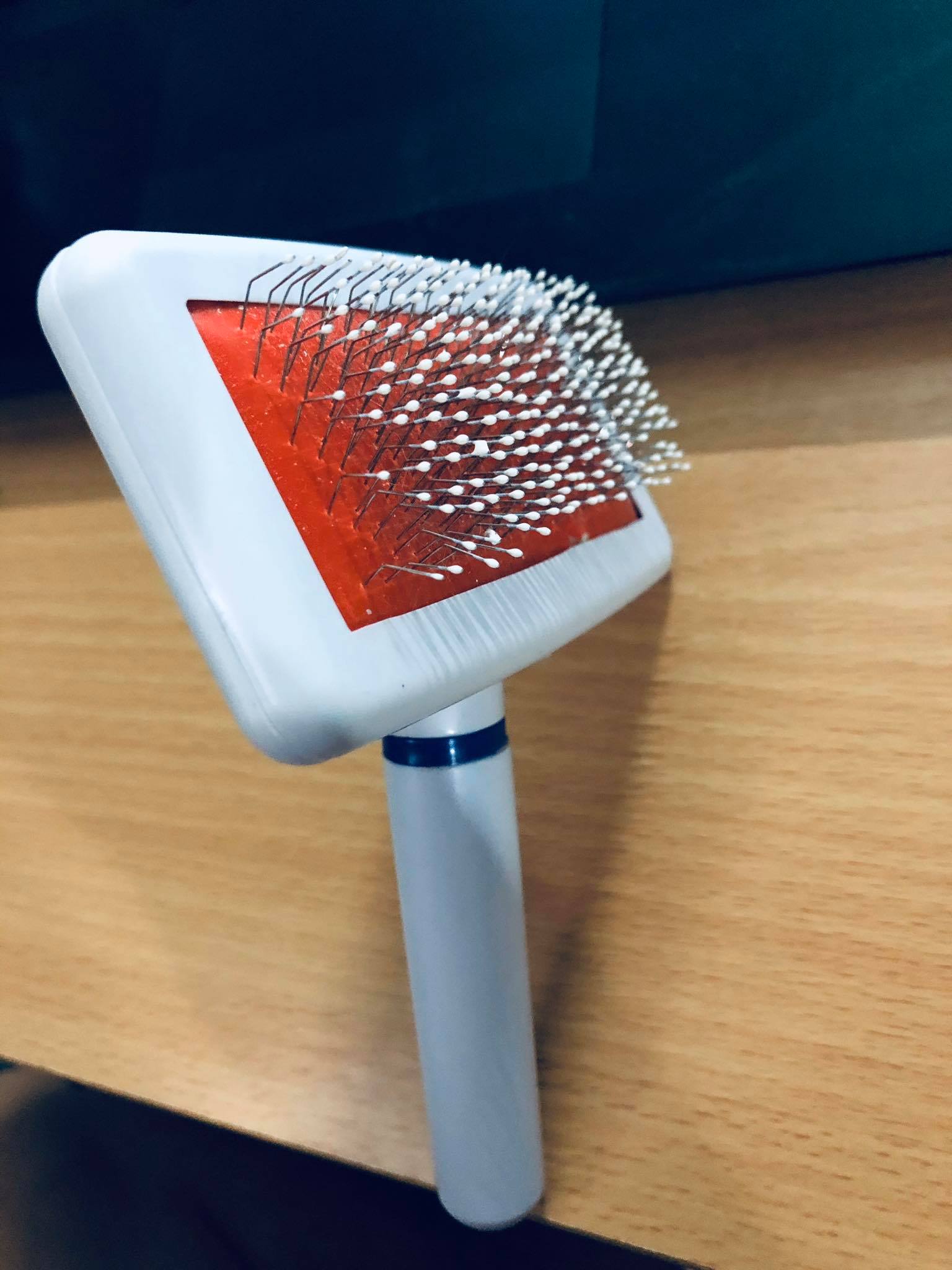 Lược chải lông rụng cho chó mèo