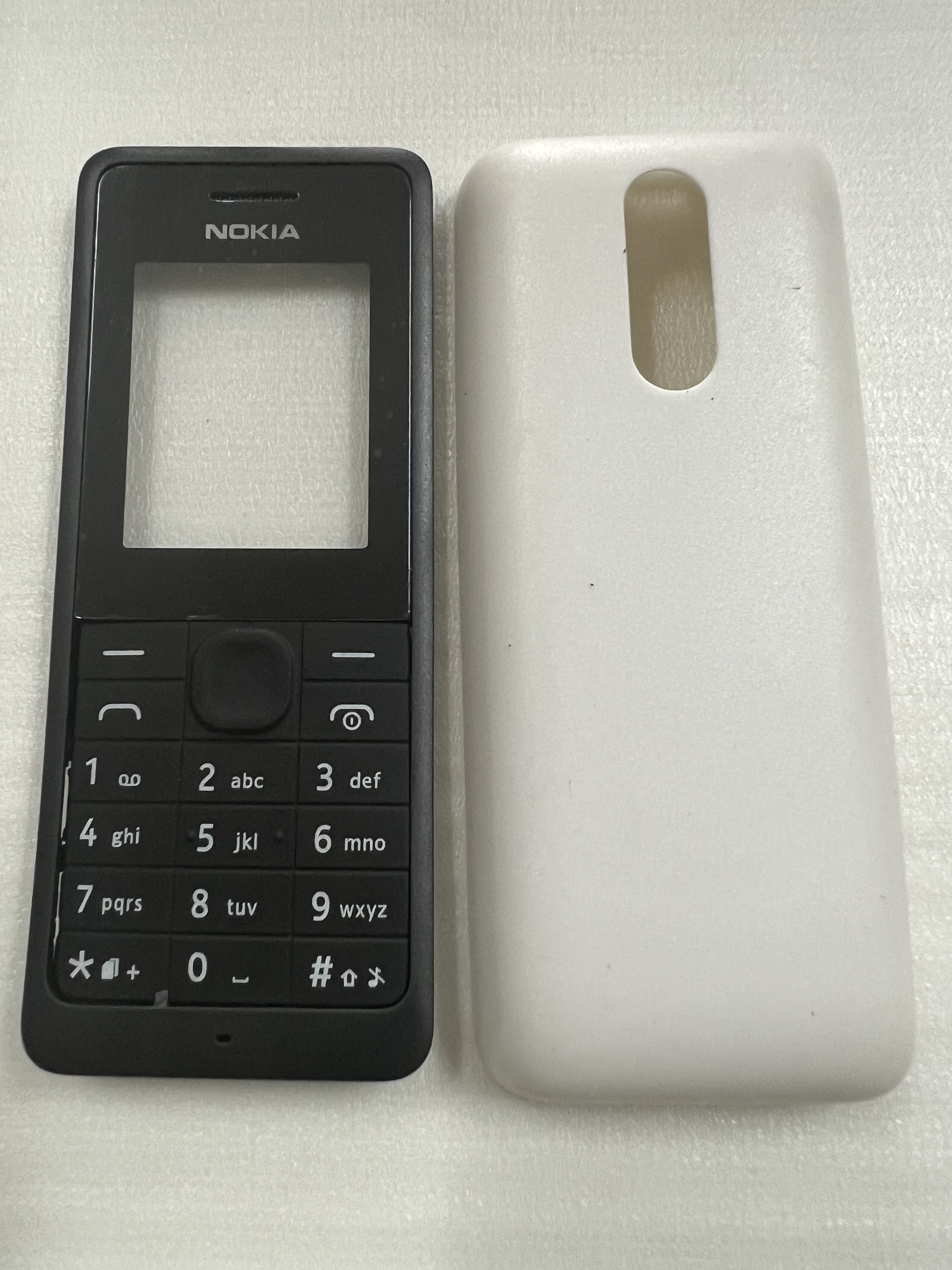 Vỏ Nokia 107 /106 ( không sườn - có phím )