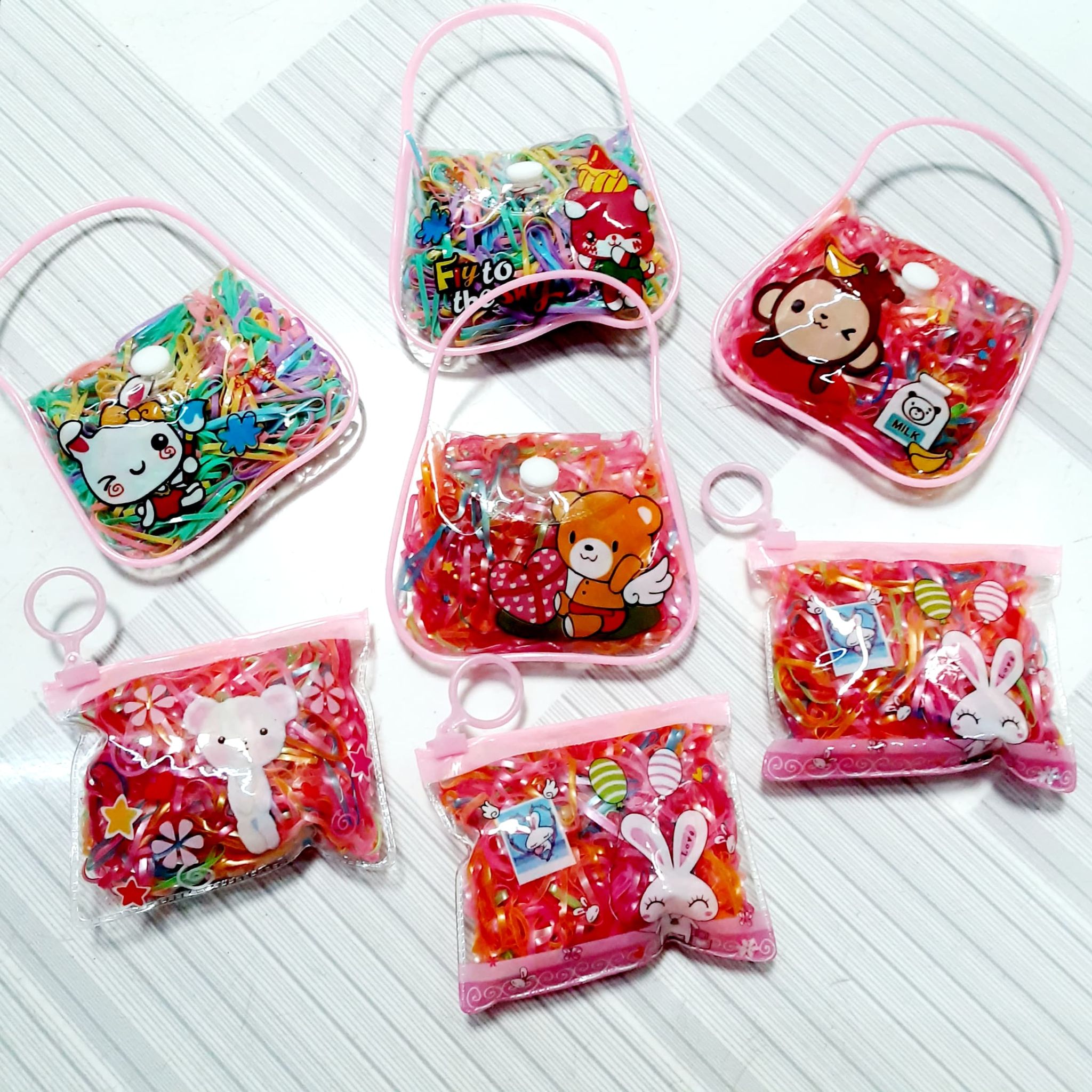 cOMBO 500 DÂY CHUN CỘT TÓC, BUỘC TÓC ĐỦ MÀU KÈM TÚI ĐẸP CUTE CHO BÉ