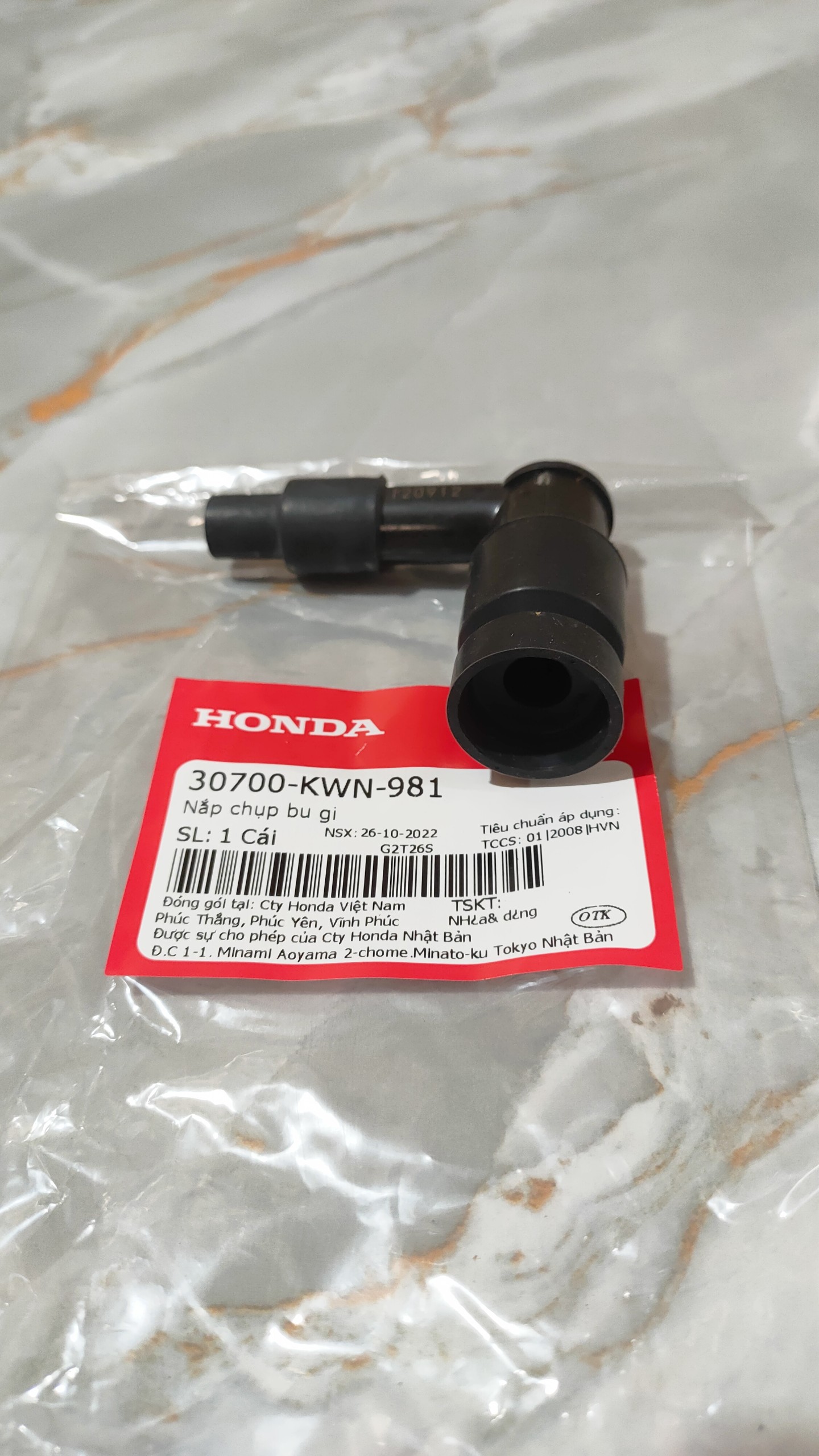 Nắp chụp bu gi PCX (30700KWN981)