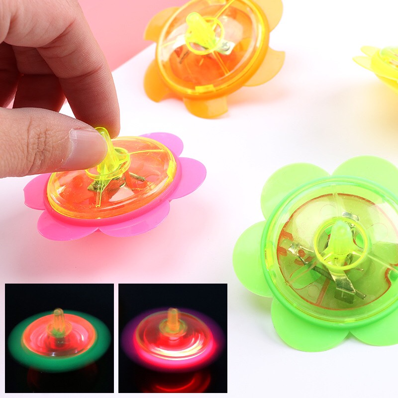Đồ chơi con quay hoa lốc xoáy có đèn cho bé