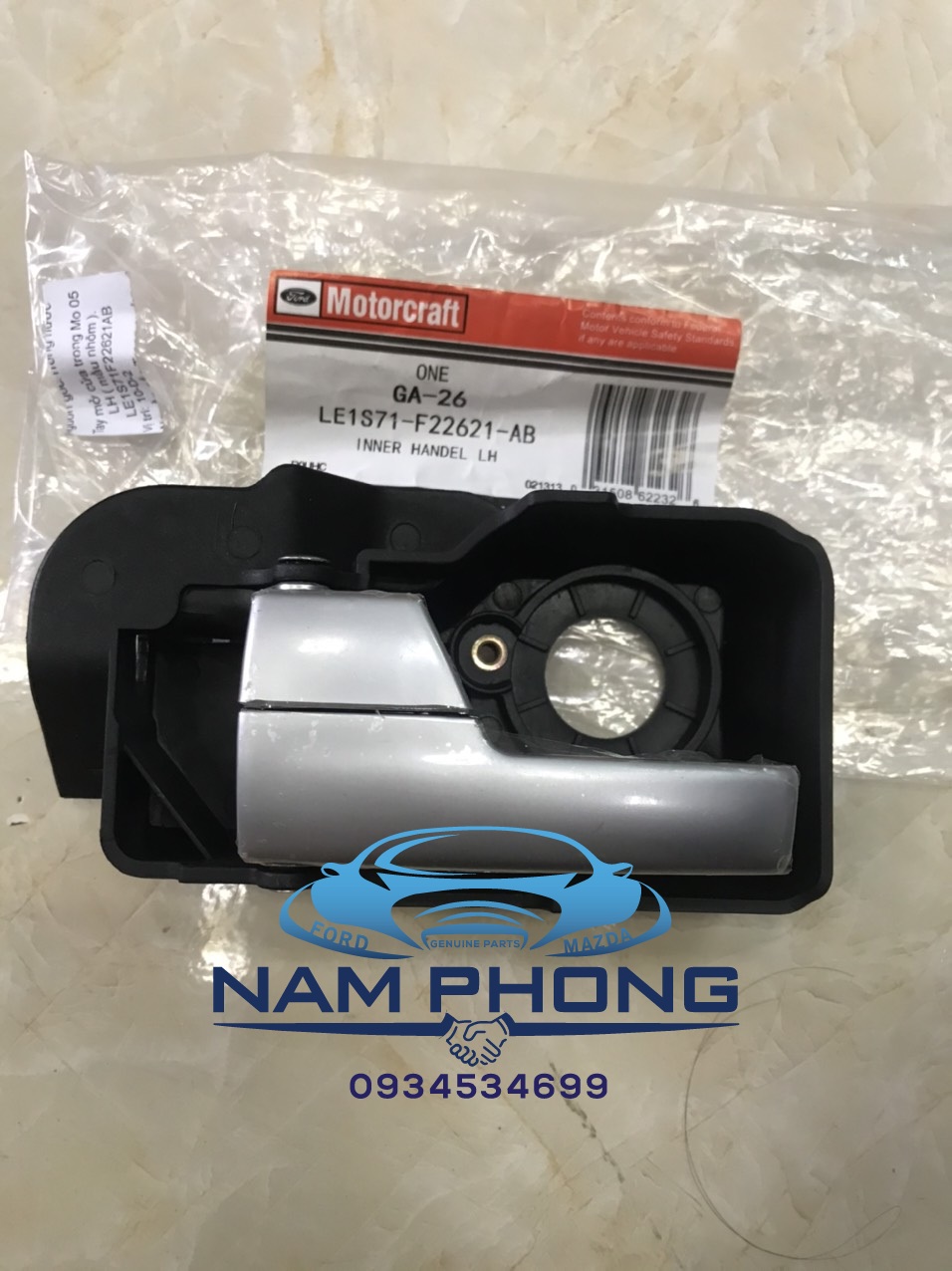 Tay mở cửa trong mondeo 05 rh le1s71f22620ab
