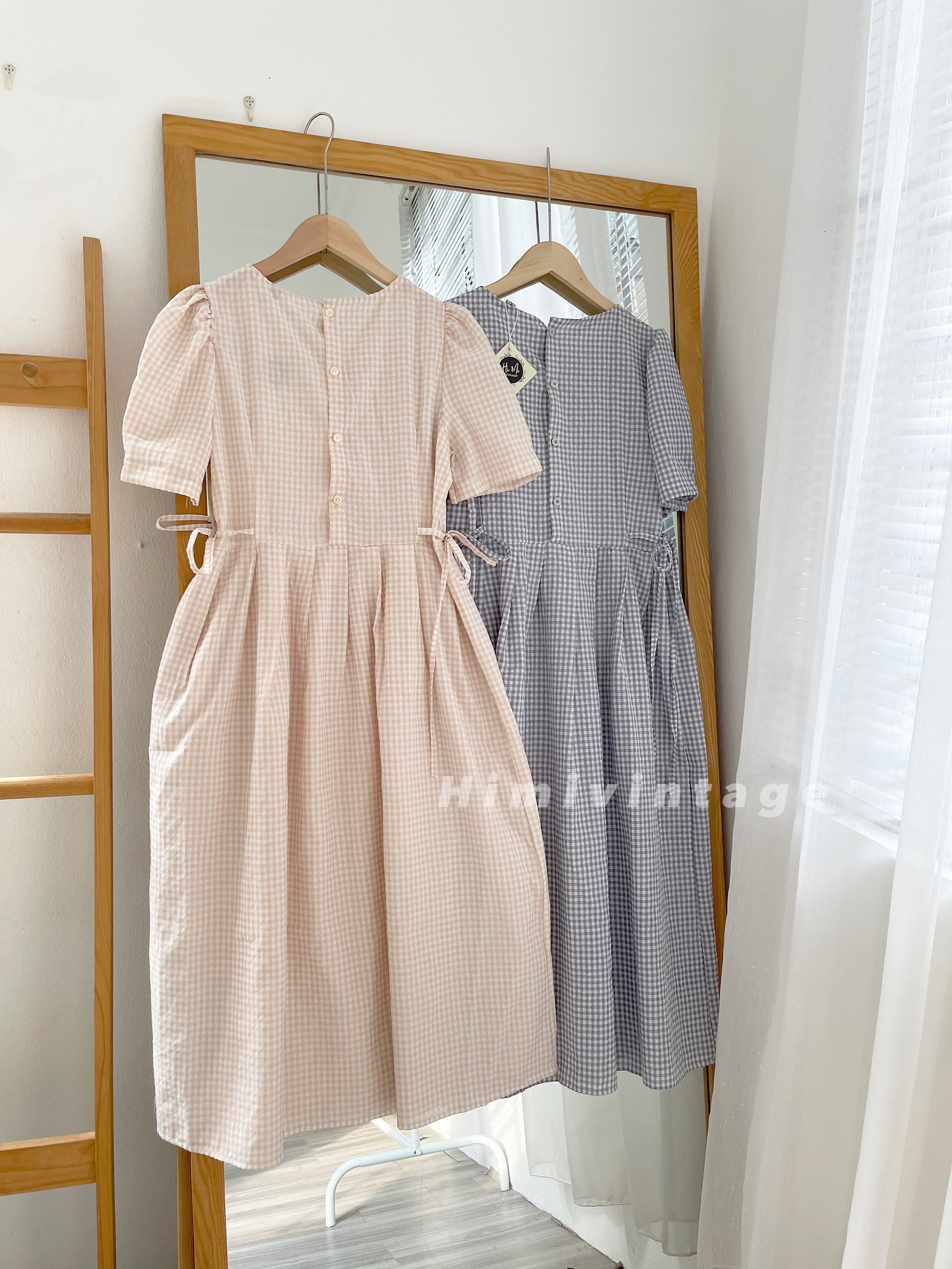 Đầm caro babydoll dây thắt nơ eo