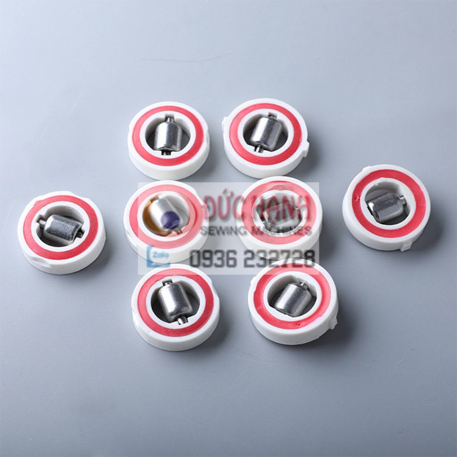 BÁNH XE MÁY CẮT VẢI ĐỨNG EASTMAN & KM