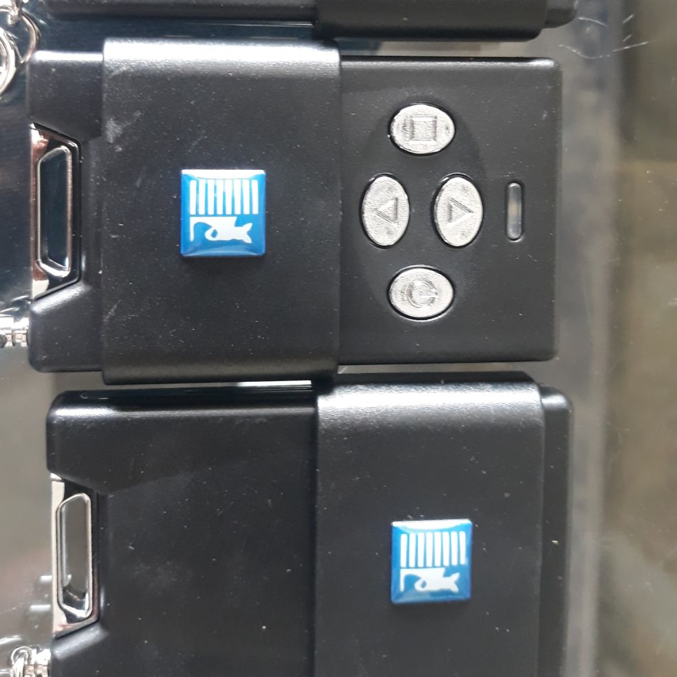 Điều khiển cửa cuốn Austdoor Xịn Tay điều khiển Austdoor 4 nút DK1