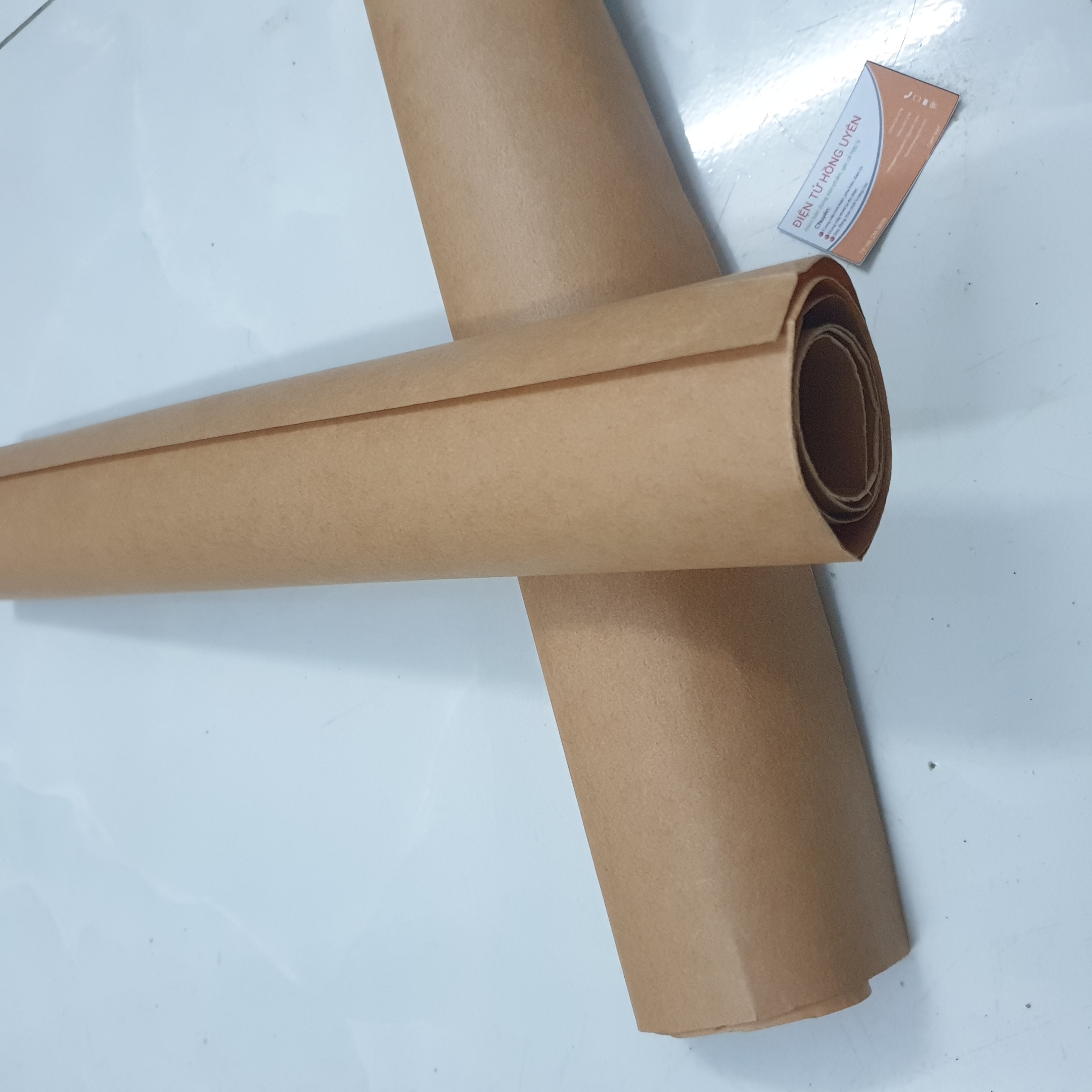 (2 tờ) Giấy cách điện quấn biến áp (loại tốt). Giấy cách điện Đức. Giấy quấn biến áp 1 vế hoặc sạc acquy. Giấy cách điện chống cháy. Giấy lót cách điện chống cháy, chống chập dây đồng