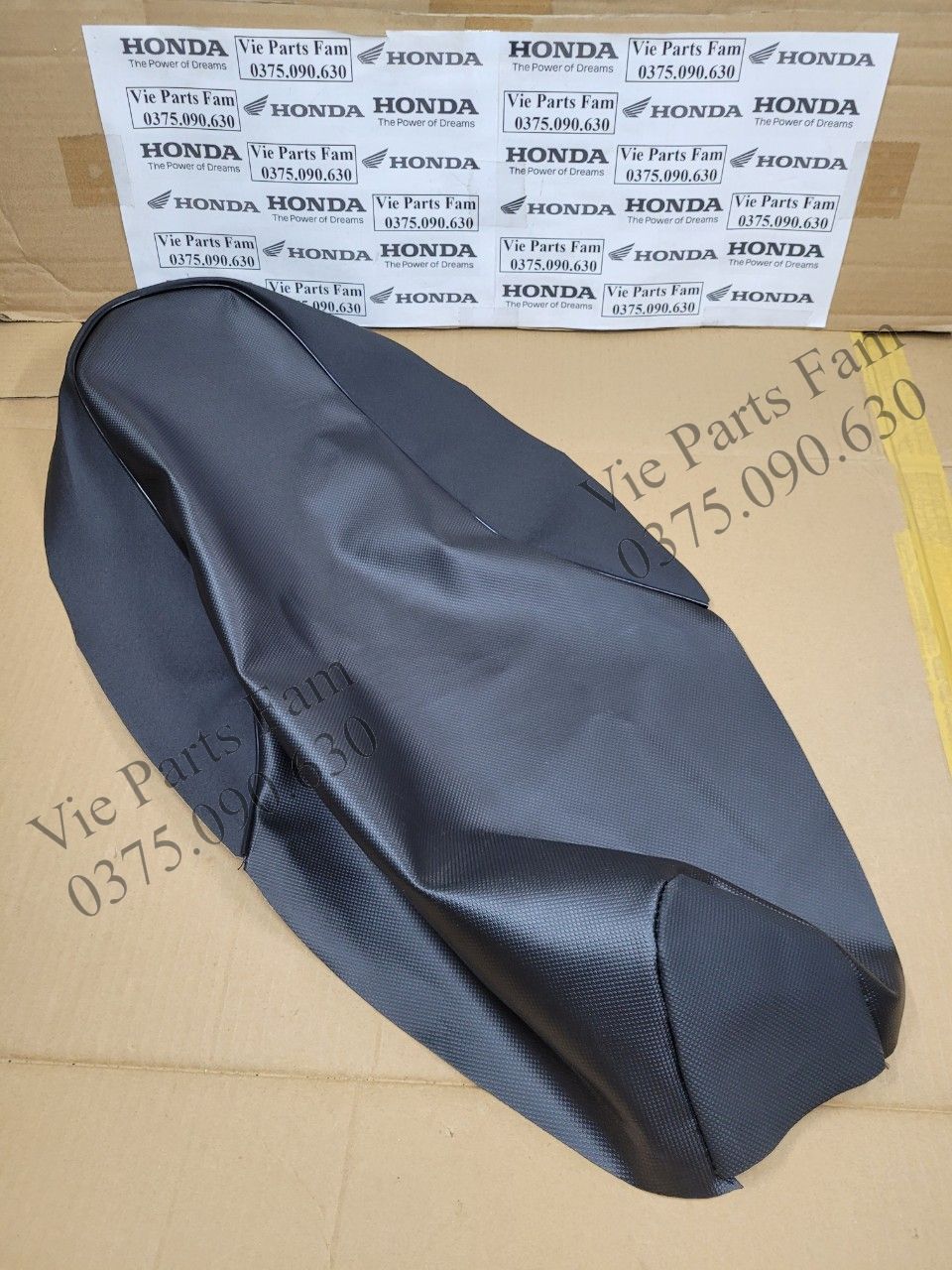 Da bọc yên (vỏ yên) Wave S110 (hàng tốt)