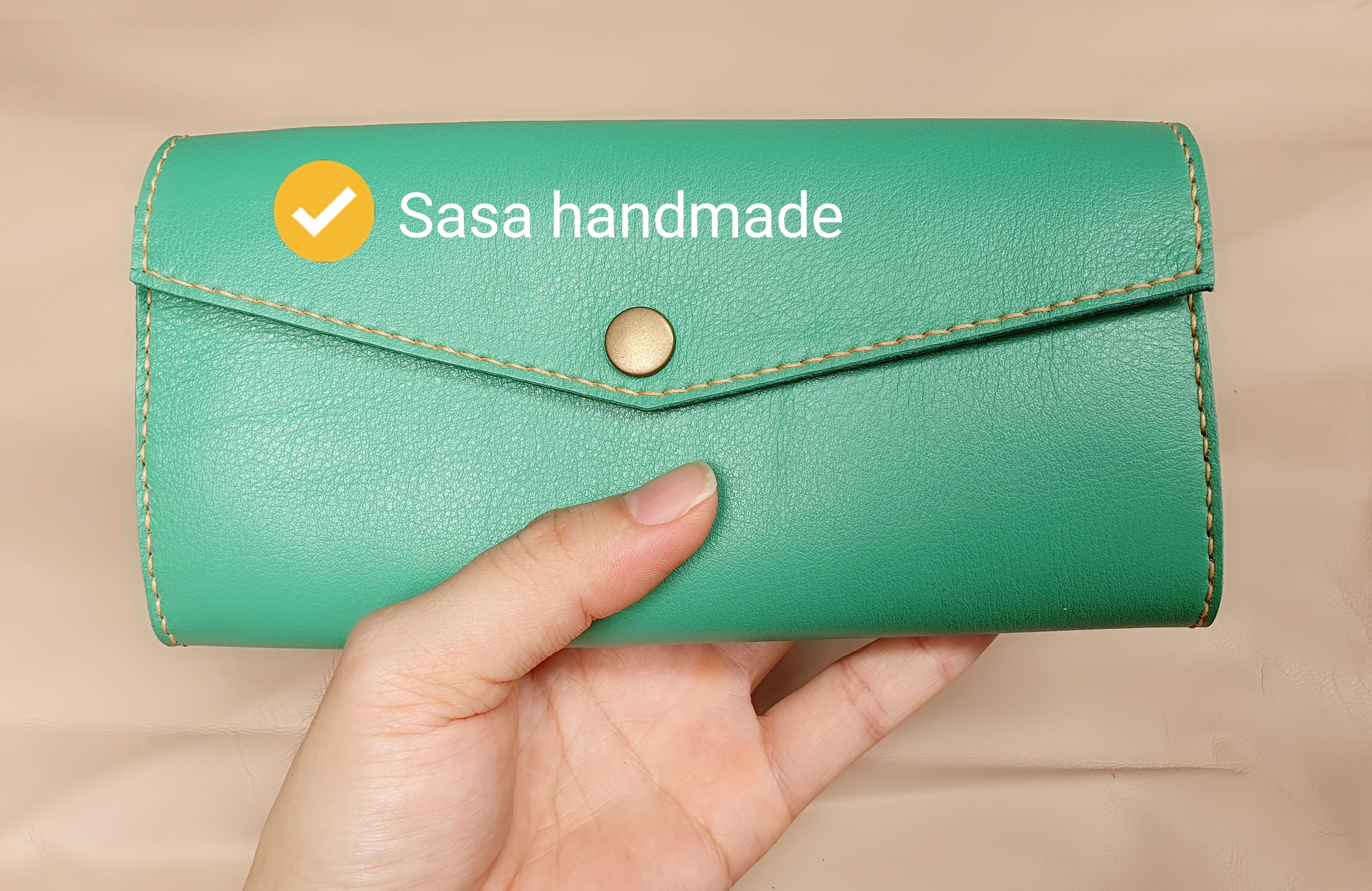 Ví nữ cầm tay bằng da handmade