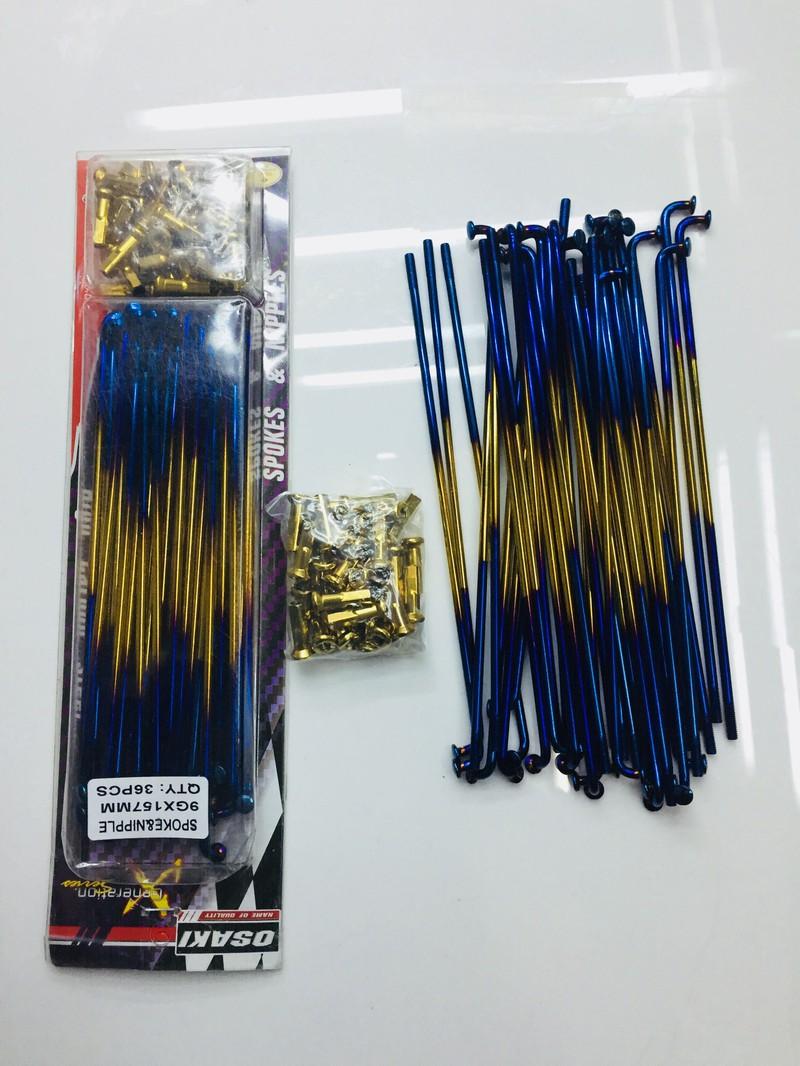 Căm xe máy hai màu xanh vàng