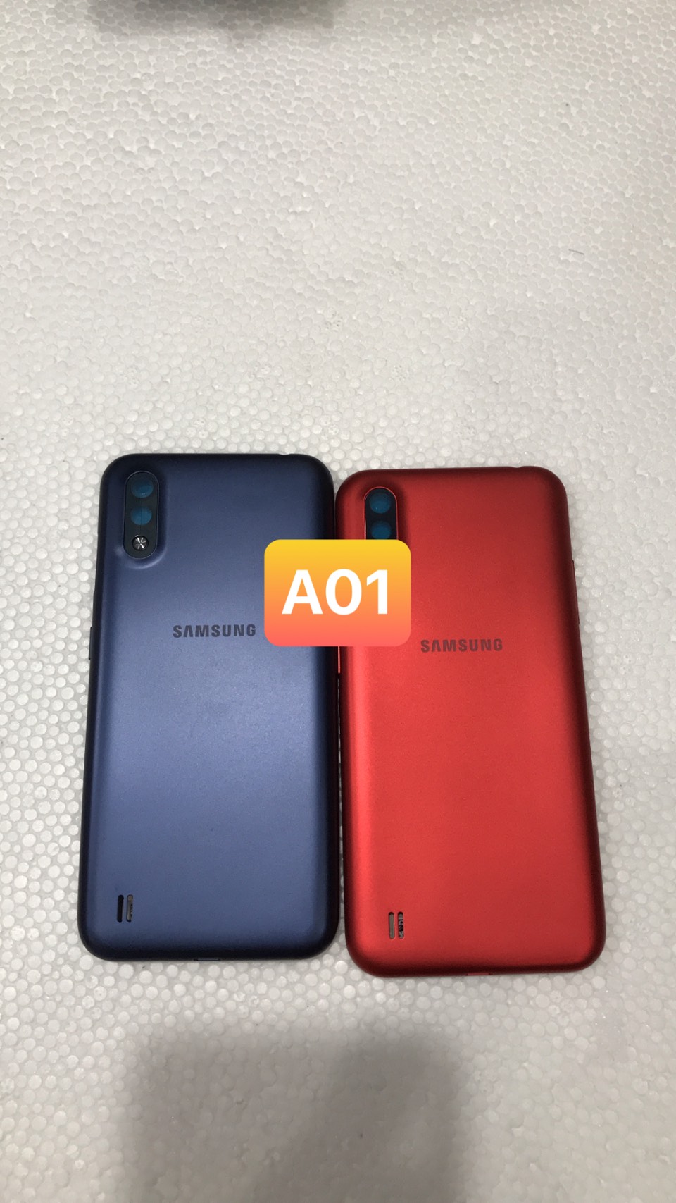 bộ vỏ a01 -samsung ( gồm sườn.lưng phím, kính cam)