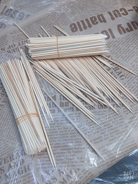 100g que xiên làm cành hoa sáp,hoa lụa,hoa giấy