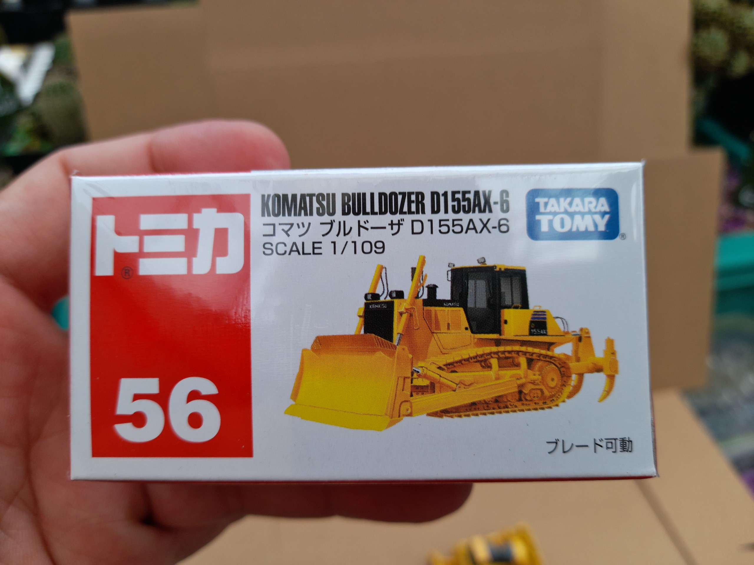 Xe mô hình Tomica (Hàng chính hãng nguyên seal số 56) - Xe công trình- Xe ủi đất màu vàng giá rẻ cho bé sưu tập