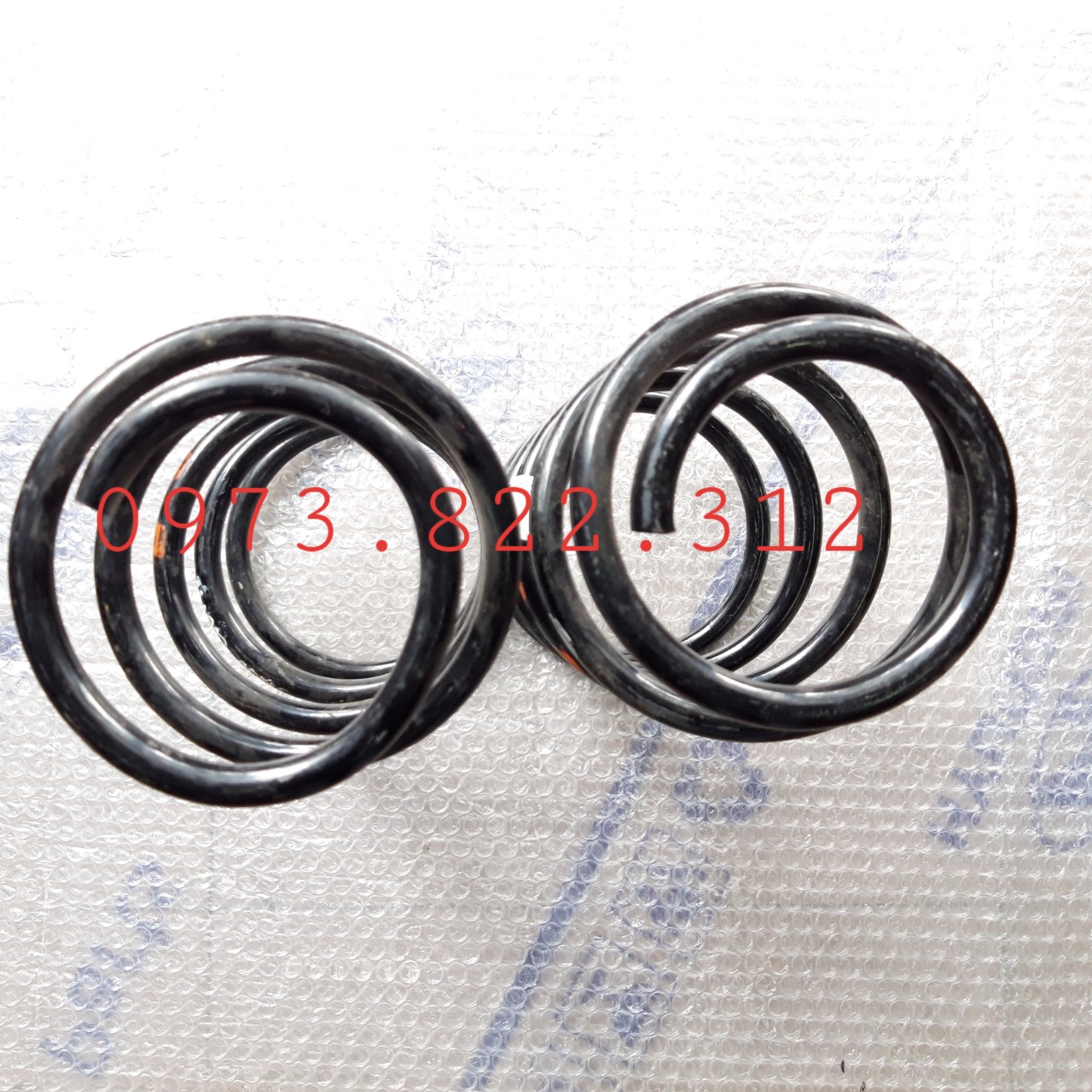 Lò xo giảm xóc sau lacetti 04-09 xịn