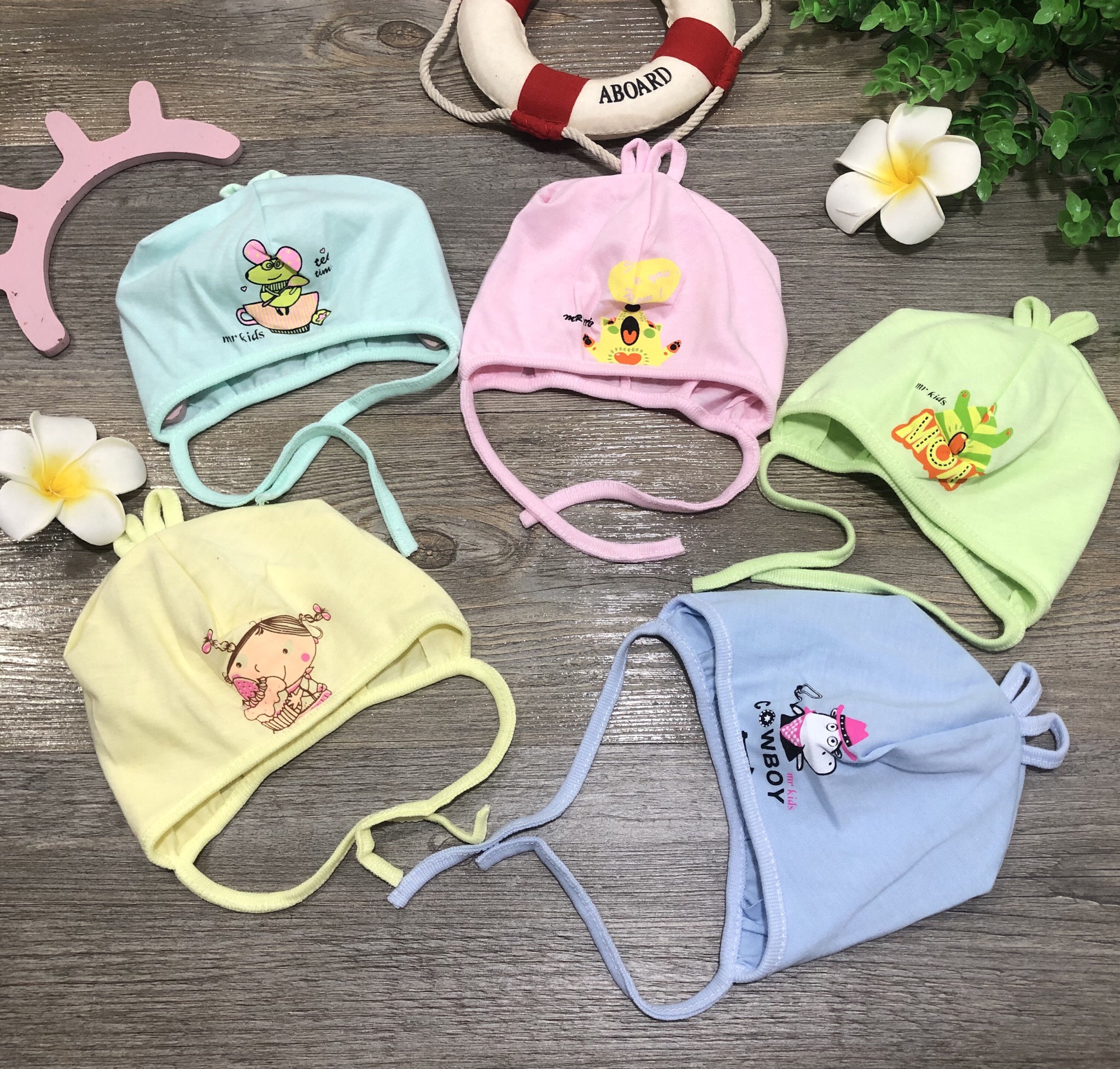 Mũ sơ sinh buộc dây cho bé sơ sinh giúp bé giữ ấm