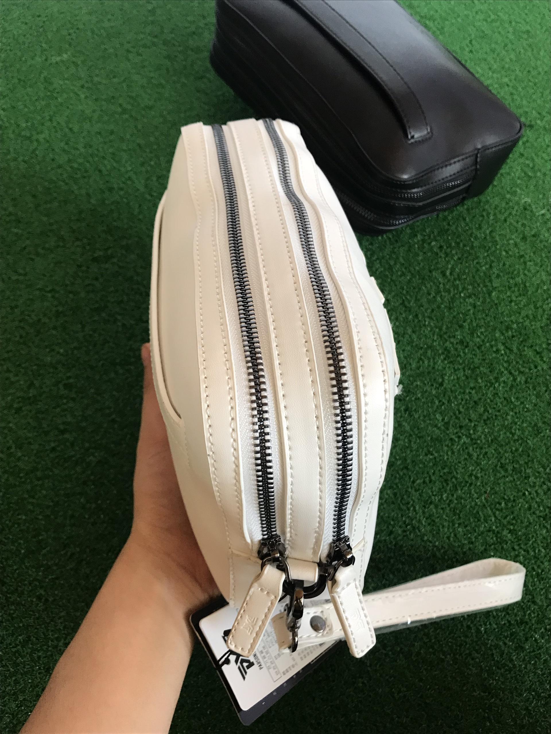Túi cầm tay golf pxg