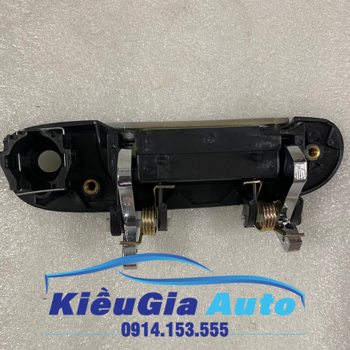 Tay mở cửa ngoài Ford Laser