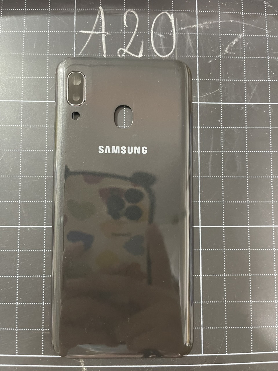 Nắp lưng thay thế Samsung A20 kèm kính camera