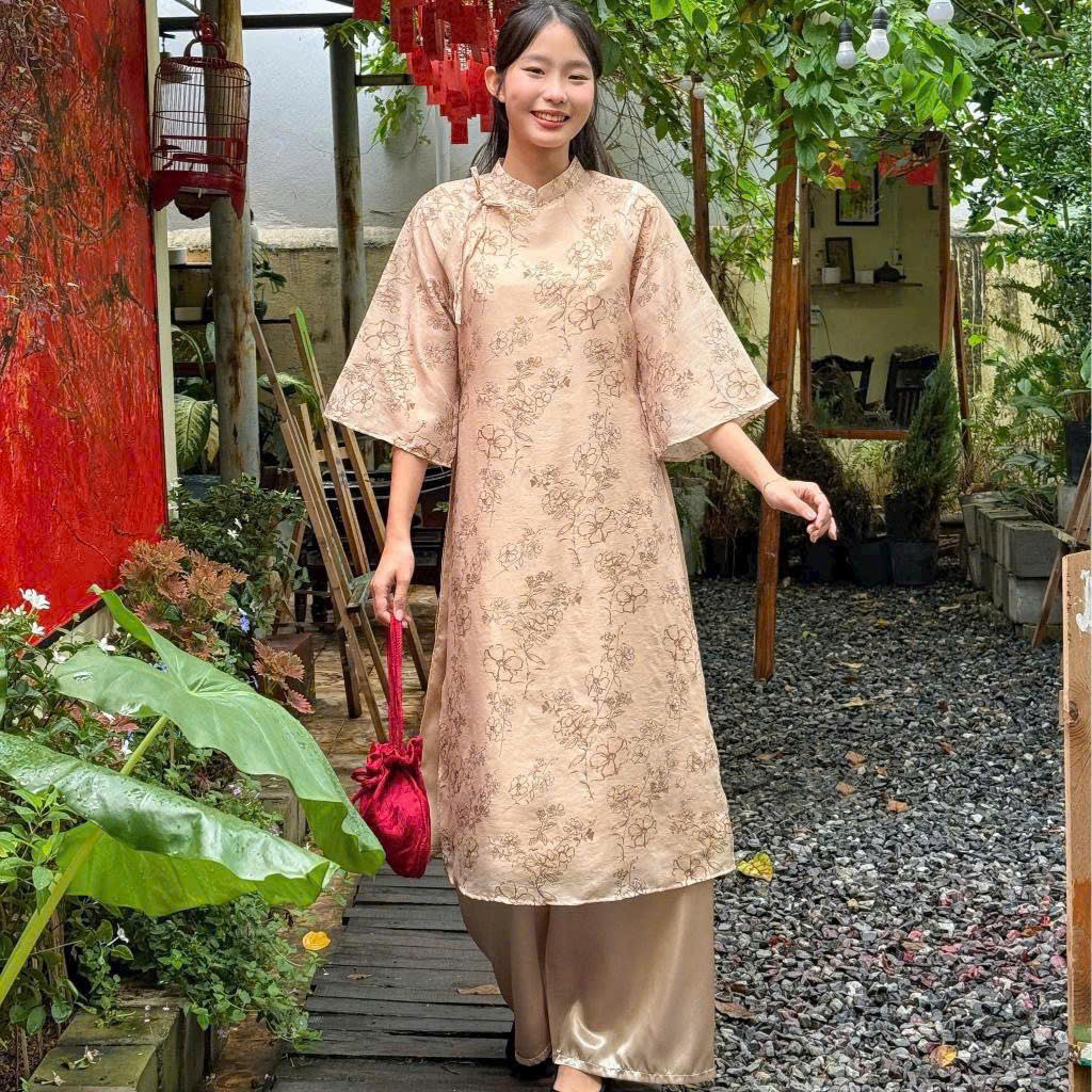 Bộ áo dài trơn màu cam lụa tằm mịn