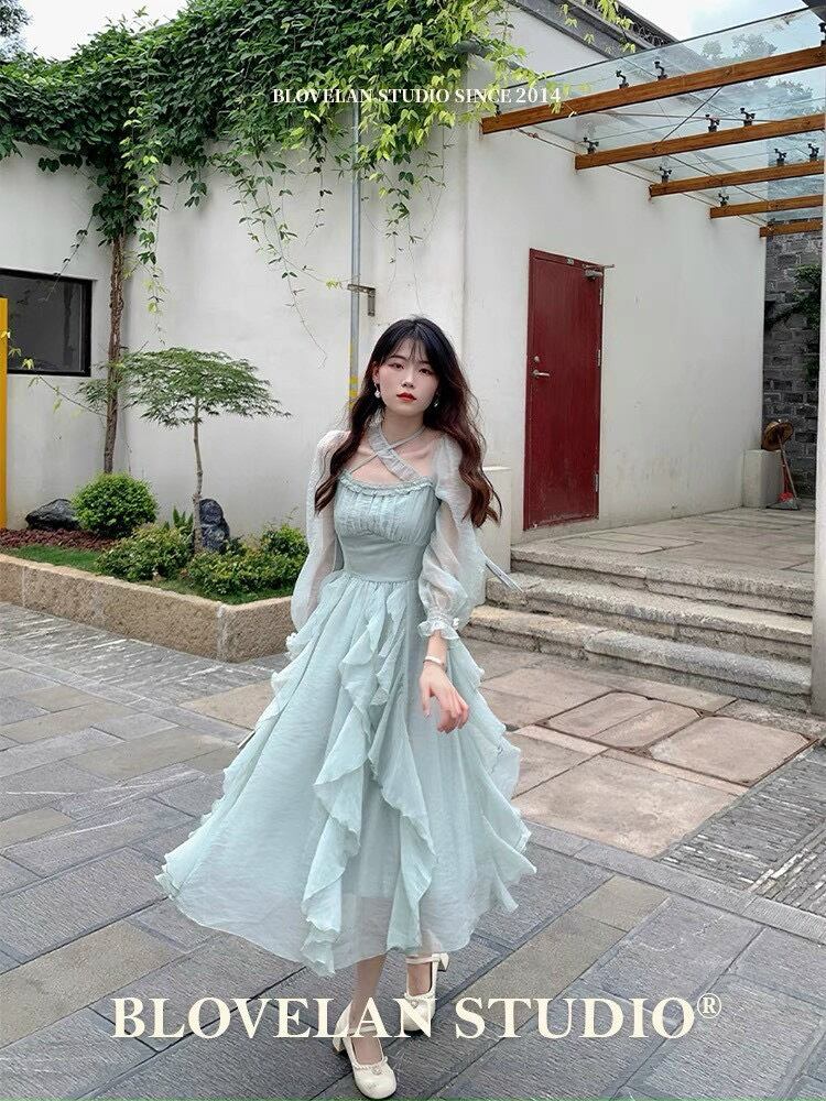 Đầm voan xanh phối bèo tầng tay dài